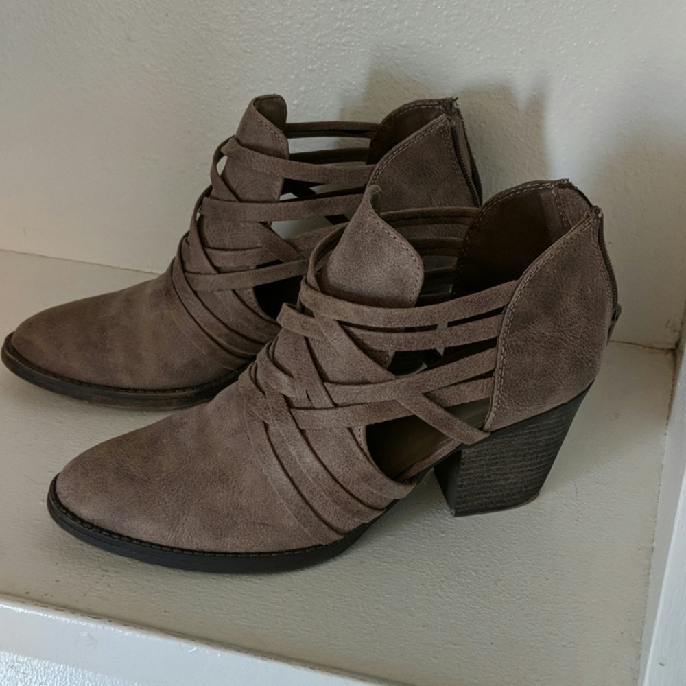 Grey Fergalicious boots.